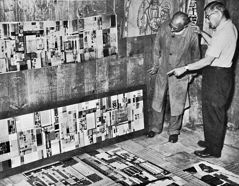 Seen here in 1955, Edmund Lewandowski (left) reviews his preparatory paintings with Giulio Padoan, master mosaicist, in Venice, to check progress, select the colors and treatment for the mosaic sections pictured on the floor. Photo: courtesy Rockwell Automation