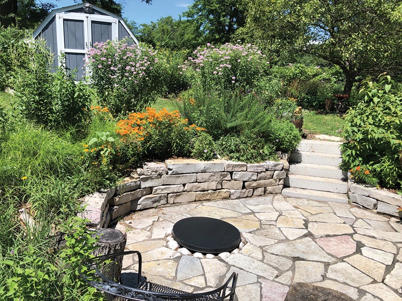Patience is key: It took three years for Amy Yocum’s native plants to mature around her backyard patio. Photo by Amy Yocum Amy Yocum's backyard patio