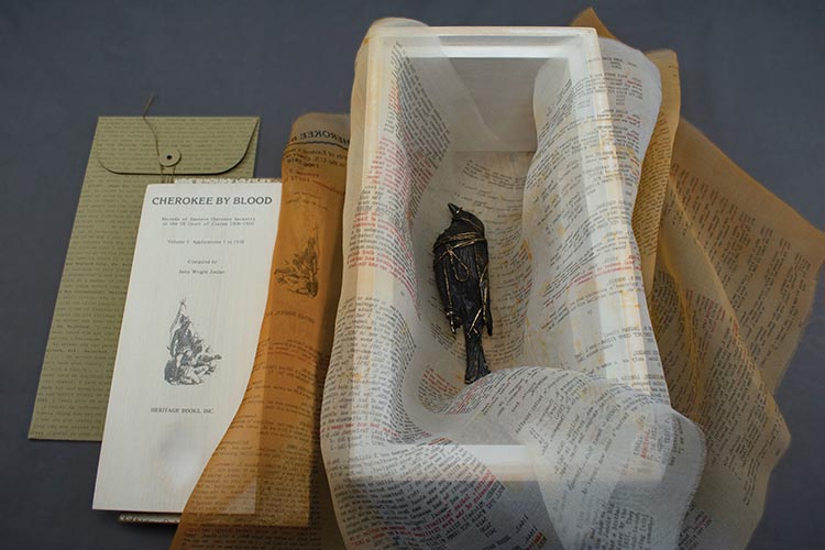 Final Determinations: Cherokee by Blood, 2017-2021, Vol. 1. Varied edition of 10 artist's books with 10 unique lost wax casts of birds. Ash wood, screenprint, procion dye, silk organza, and bronze. Dimensions variable.