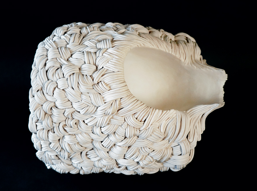 Demitra Copoulos, Square Hair, 2013. Fired ceramic, orange and lavender oil; 15 by 16 by 15 inches.
