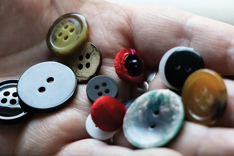 Buttons in a hand