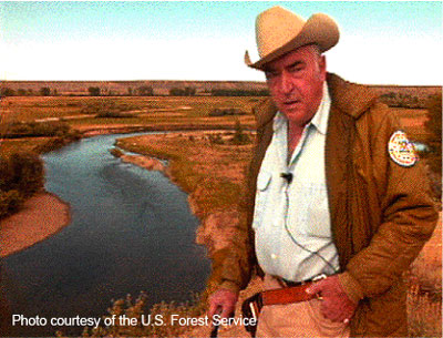 Dr. Luna Leopold discusses the importance of bankfull discharge on the New Fork River near Boulder, Wyoming. Photo courtesy of U.S. Forest Service