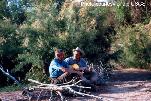 In the midst of a research expedition in Cataract Canyon, Utah, former USGS Chief Hydrologist Luna Leopold and eminent physicist Ralph Bagnold take a moment to rest.