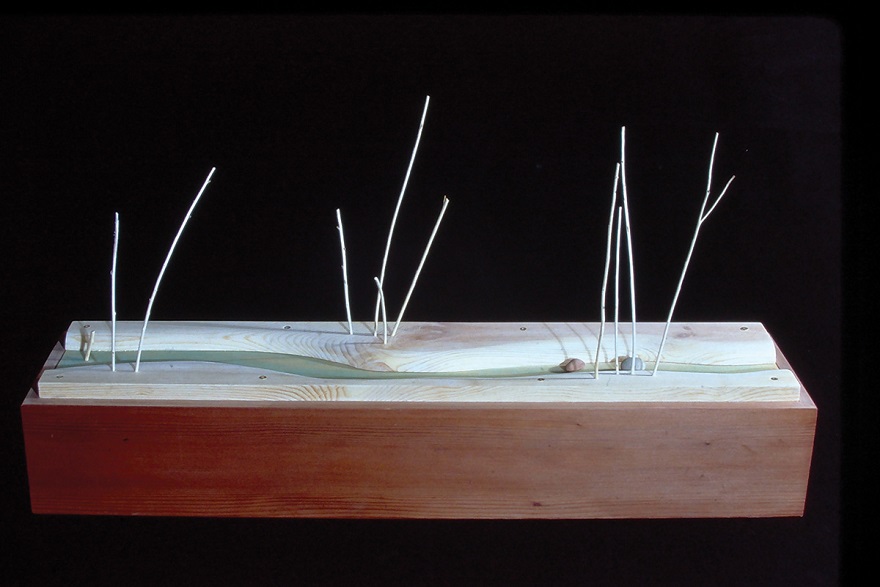 Truman Lowe, Stream Segment #2, 1991, wood, watercolor, stones, 18 x 34 1/2 x 8 1/2 in. Estate of Truman Lowe