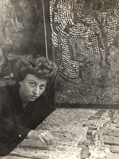 Marjorie Kreilick, at 35, works on a mosaic panel in her UW-Madison studio just prior to leaving for Italy to create the State Office Building murals. Photographer unknown, courtesy Marjorie Kreilick Legacy Foundation