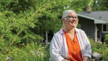 Amy Yocum sitting in her garden. Photo by Beth Skogen